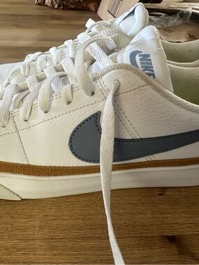 Nike White Leather Sneakers with Gray Swoosh and Tan Accent